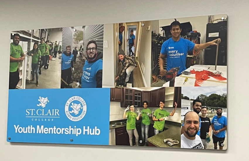 Youth Mentorship Hub sign closeup 